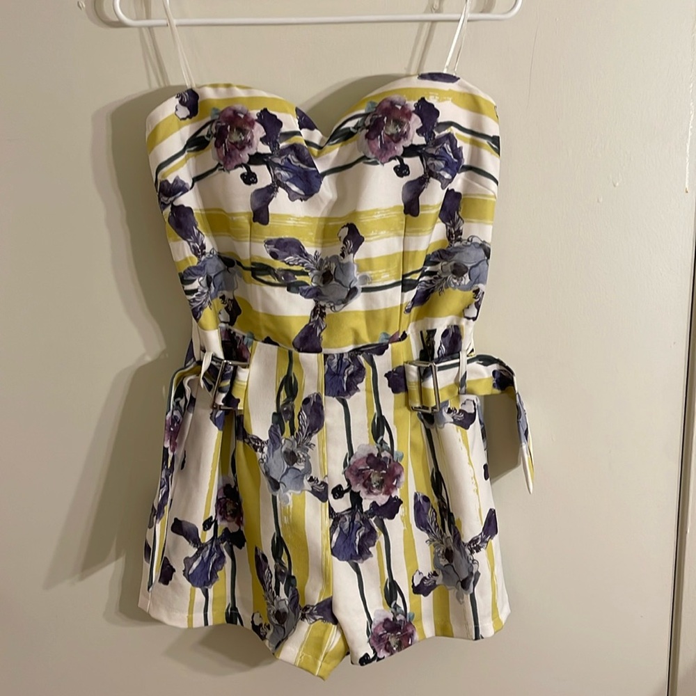Beautiful woman’s jumpsuit short large. Yellow with floral print